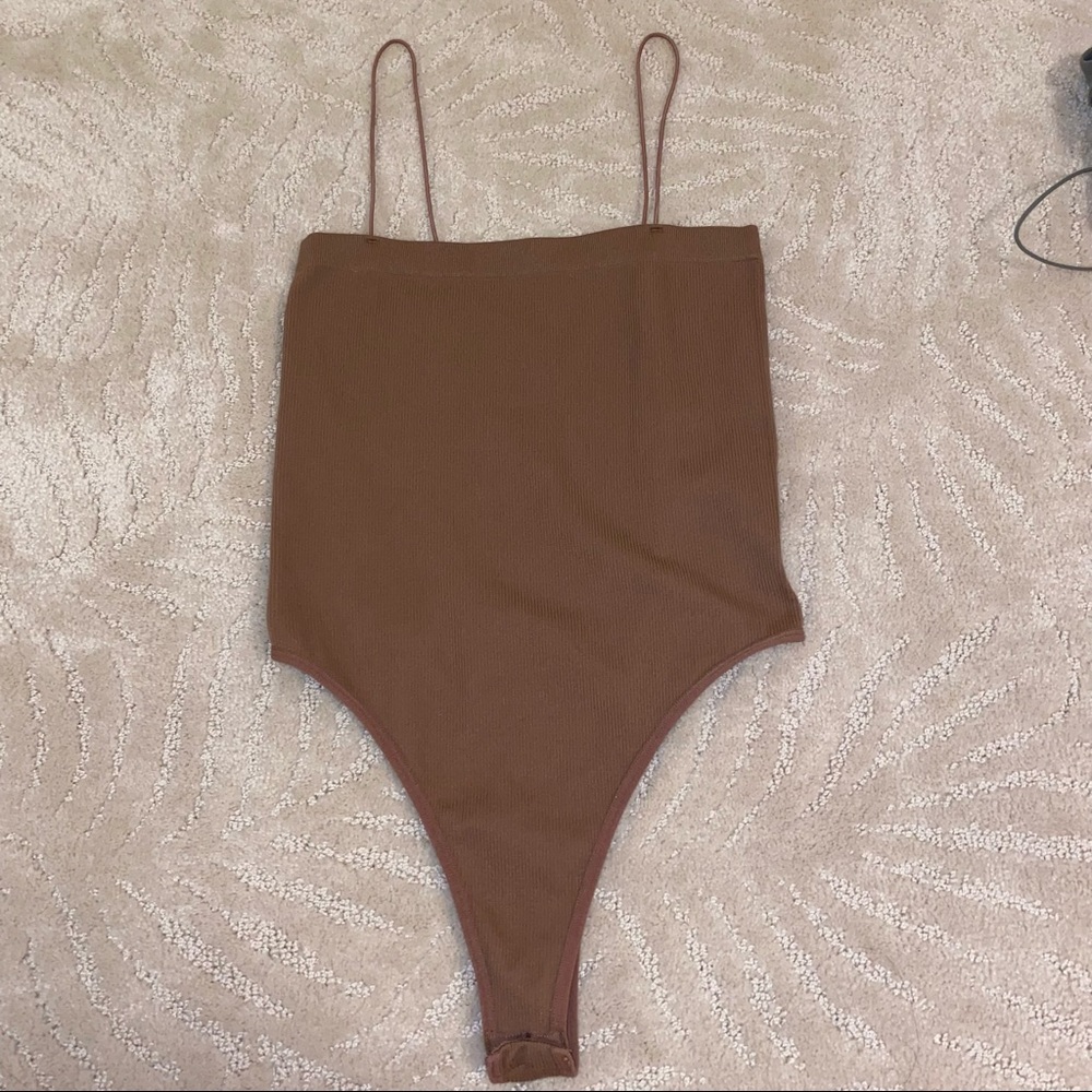 brown bodysuit